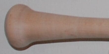 Wooden baseball bat handle close-up.